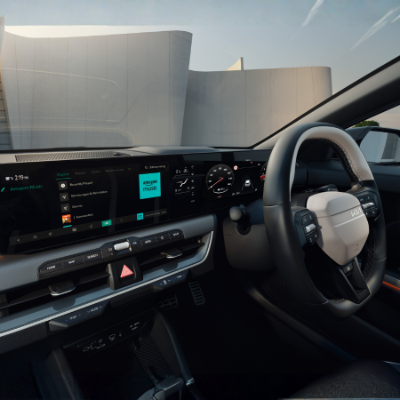 Car interior with digital dashboard and infotainment system.