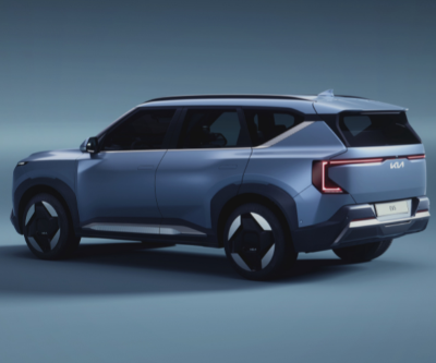 Blue SUV with a modern design, displayed in a side and rear view.